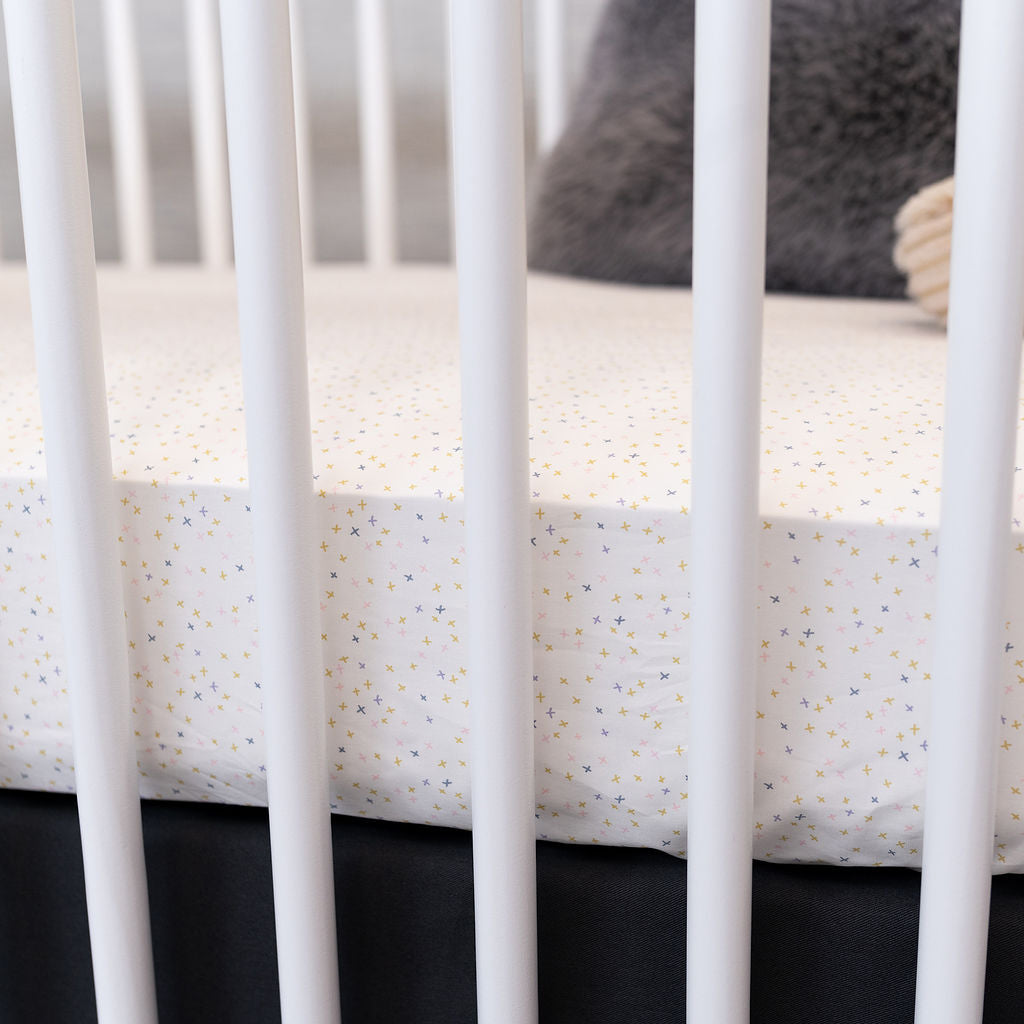 Little Tiny Hugs - Fitted Crib Sheet - Multi-colored Freehand X's on Ivory - Olli+Lime